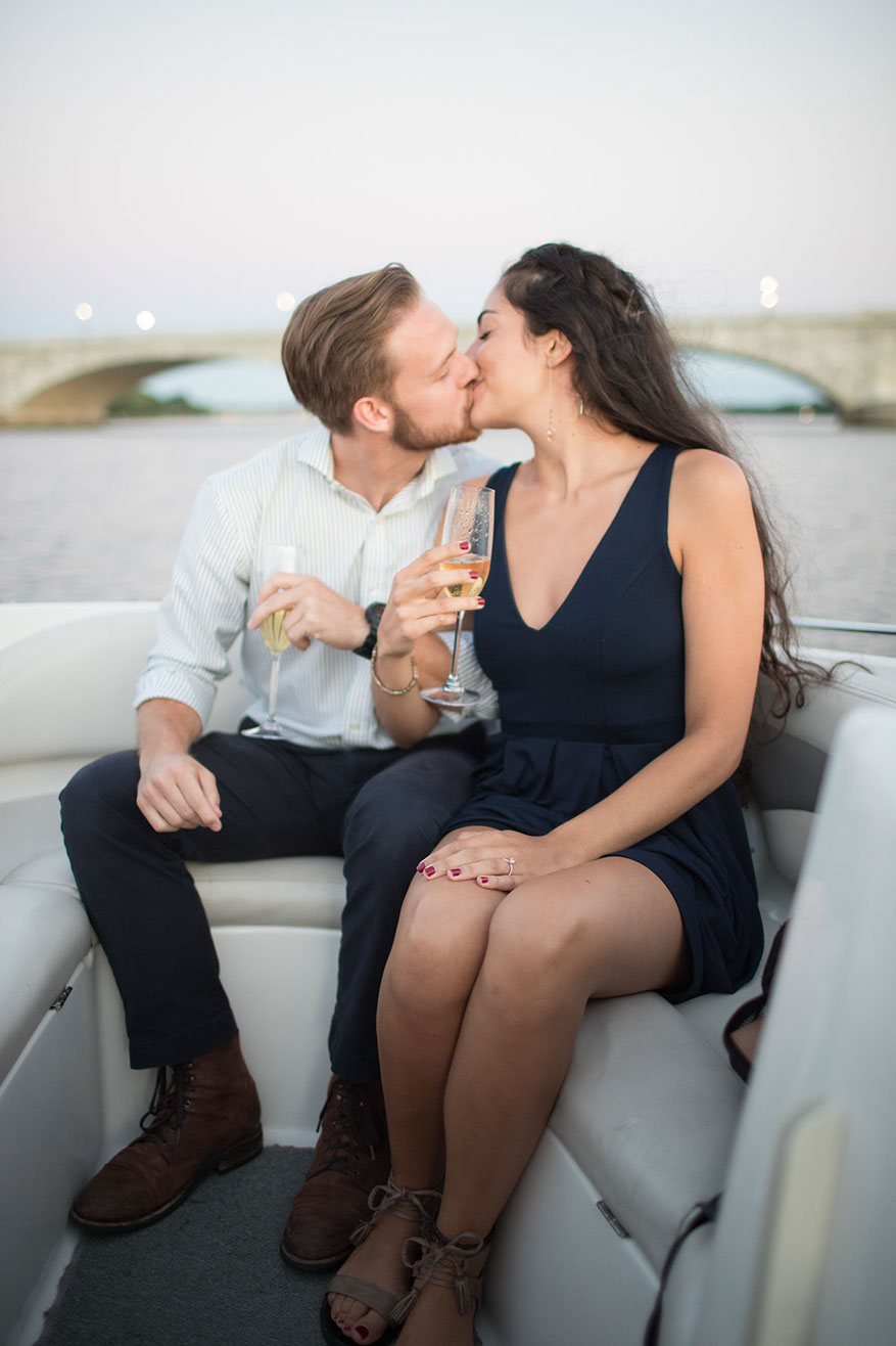 A sunset proposal session is photographed Potomac river privite boat tour by Snowdrop Photography